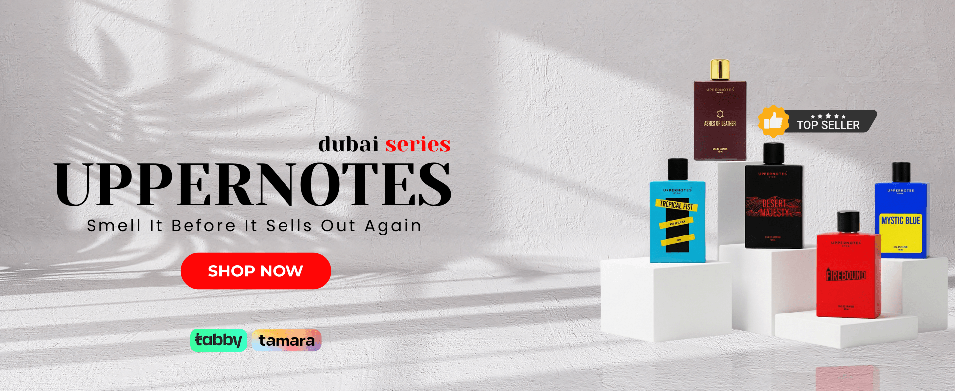 Perfume bottles on display with 'Dubai Series Uppernotes' branding and 'Smell It Before It Sells Out Again' text.