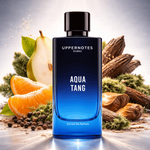 Blue perfume bottle labeled 'Aqua Tang' by Uppernotes Dubai with natural elements in the background.