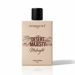 Perfume bottle labeled 'Desert Majesty Midnight' by Uppernotes Dubai on a white background