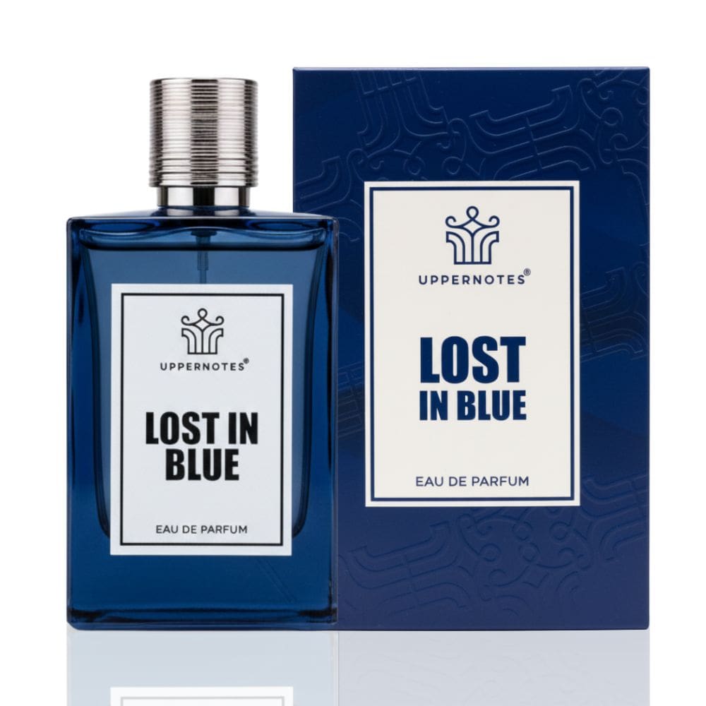 Blue perfume bottle and packaging of 'Lost in Blue' by Uppernotes on a white background