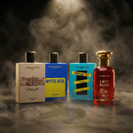 Four Uppernotes perfume bottles with their packaging on a dark background with smoke effect.